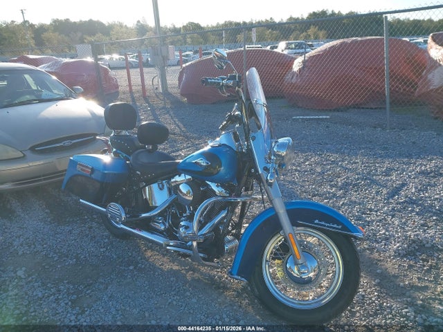 2011 HARLEY-DAVIDSON FLSTC 1HD1BW519BB038125