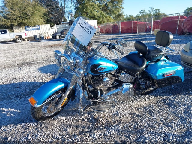 2011 HARLEY-DAVIDSON FLSTC 1HD1BW519BB038125 Photo 1