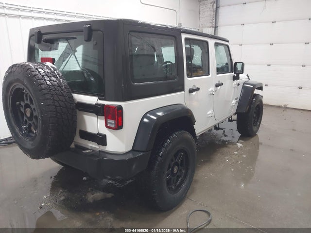 1C4BJWDG4EL296162 Jeep Wrangler Unlimited Sport