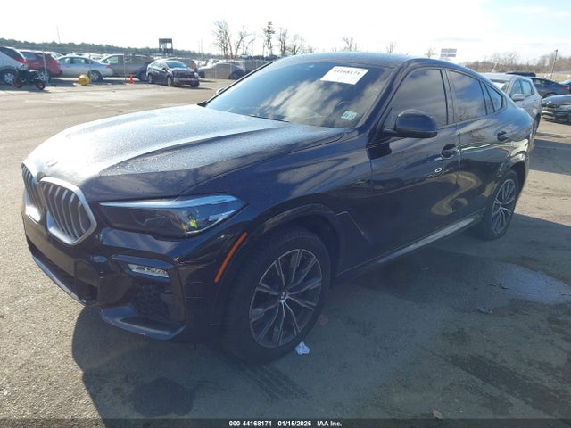 2021 BMW X6 5UXCY6C03M9E62687 Photo 1