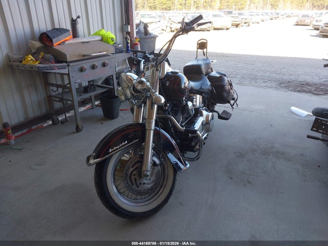 2011 HARLEY-DAVIDSON FLSTC 1HD1BW516BB019435 Photo 1