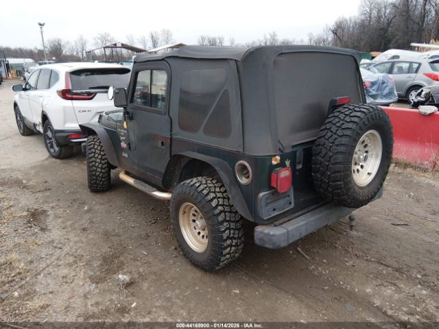 1999 JEEP WRANGLER 1J4FY19S9XP468625 Photo 2