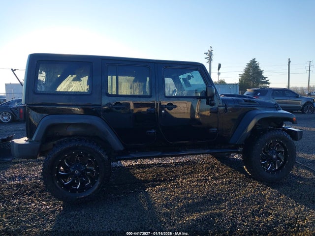 1C4HJWDG3EL197701 Jeep Wrangler Unlimited Sport