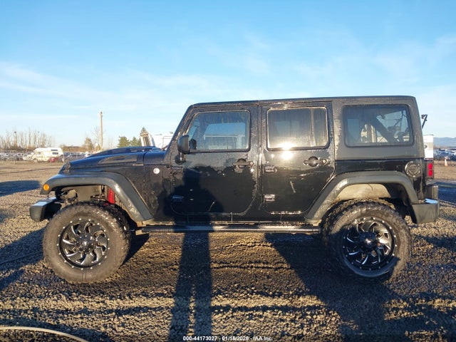 1C4HJWDG3EL197701 Jeep Wrangler Unlimited Sport