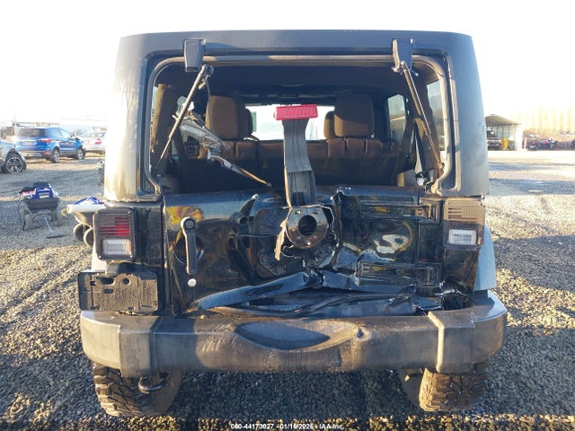 1C4HJWDG3EL197701 Jeep Wrangler Unlimited Sport