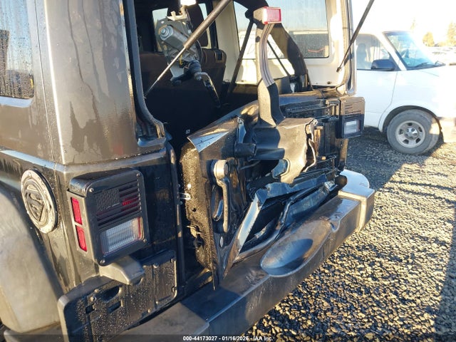 1C4HJWDG3EL197701 Jeep Wrangler Unlimited Sport