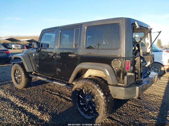 1C4HJWDG3EL197701 Jeep Wrangler Unlimited Sport