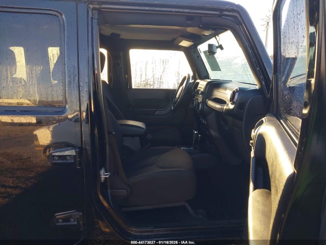 1C4HJWDG3EL197701 Jeep Wrangler Unlimited Sport