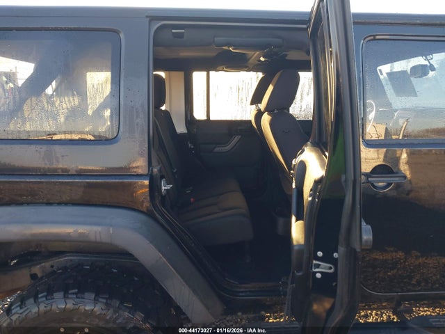 1C4HJWDG3EL197701 Jeep Wrangler Unlimited Sport