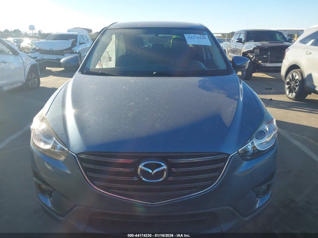 2016 Mazda Cx-5 Touring მანქანა იყიდება აუქციონზე, vin: JM3KE2CY9G0900095, აუქციონის ნომერი: 44174230