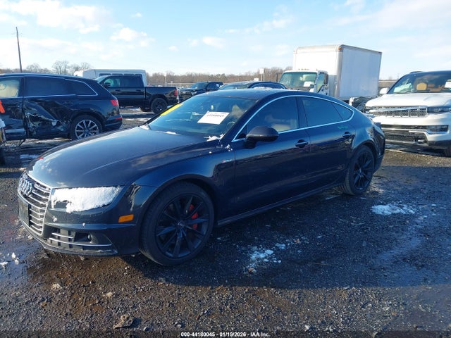 2016 AUDI A7 WAU2GAFC3GN014920 Photo 1