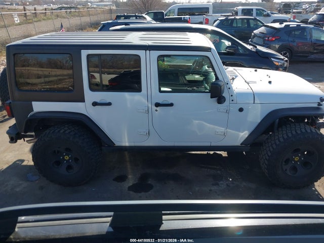 1C4HJWDG7GL283435 Jeep Wrangler Unlimited Sport