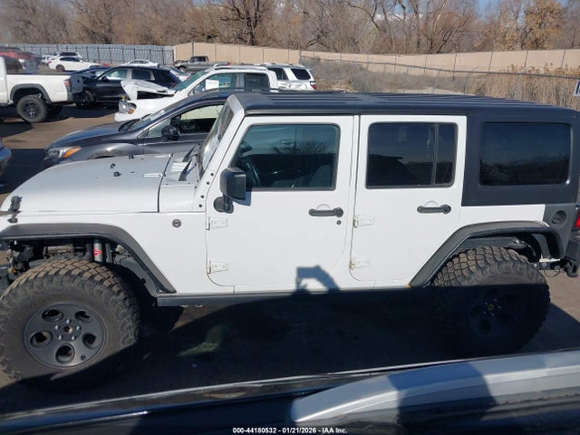 1C4HJWDG7GL283435 Jeep Wrangler Unlimited Sport