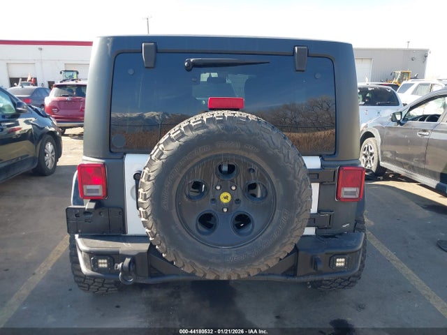 1C4HJWDG7GL283435 Jeep Wrangler Unlimited Sport