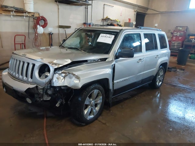 1C4NJRFB9ED585600 Jeep Patriot Latitude