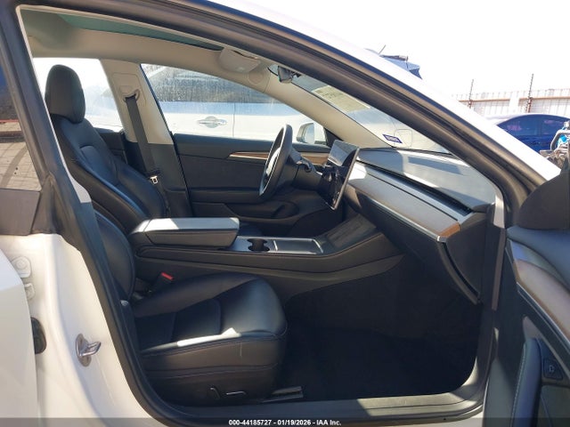 2023 TESLA MODEL 3 5YJ3E1EAXPF606990 Photo 4