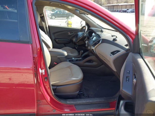 KM8JUCAG6EU853973 Hyundai TUCSON SE