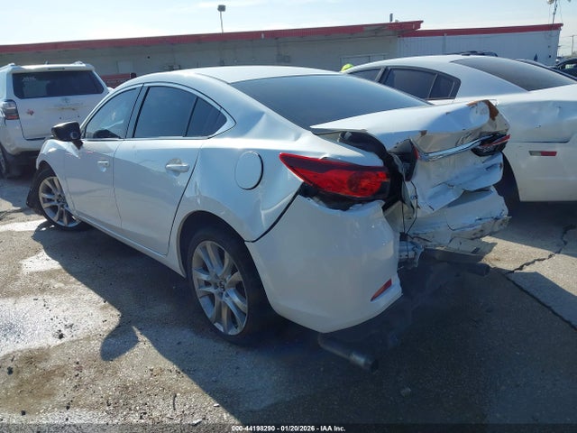 JM1GJ1V6XE1145272 Mazda py