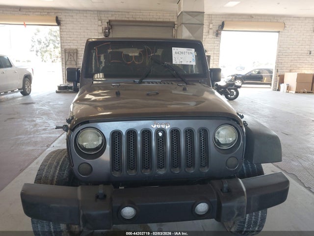 1C4AJWAG4GL259955 Jeep Wrangler Sport