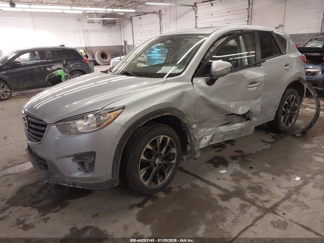 2016 Mazda Cx-5 Grand Touring მანქანა იყიდება აუქციონზე, vin: JM3KE4DY7G0680868, აუქციონის ნომერი: 44203145