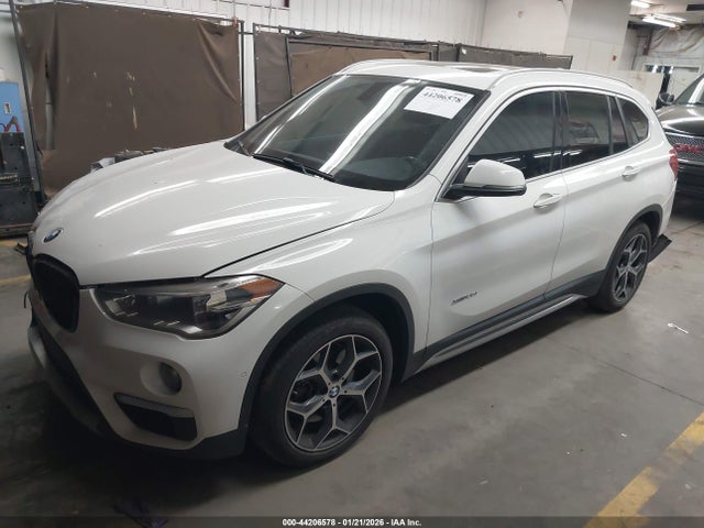 2016 BMW X1 WBXHT3C37GP885402 Photo 1