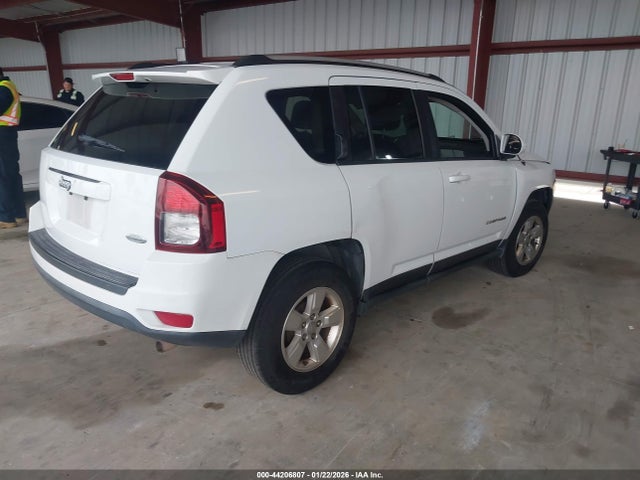 1C4NJCEA9GD666721 Jeep Compass Latitude