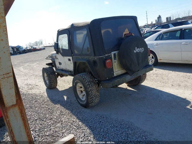 2000 JEEP WRANGLER 1J4FA29P2YP800475 Photo 2