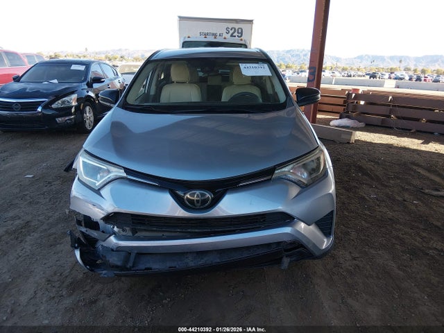 JTMZFREV9JJ172621 Toyota RAV4 LE