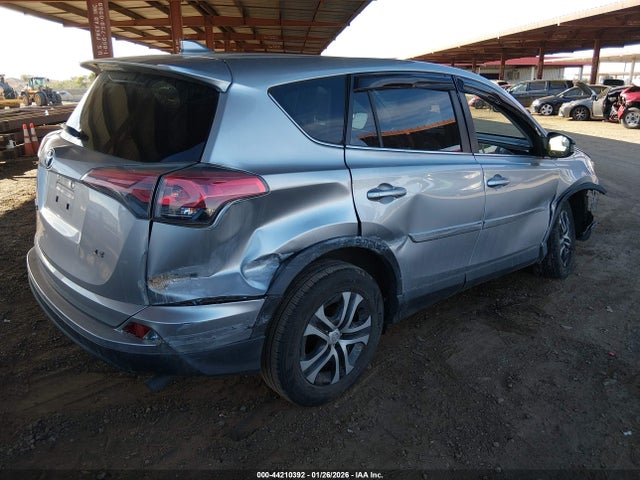 JTMZFREV9JJ172621 Toyota RAV4 LE