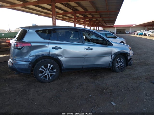 JTMZFREV9JJ172621 Toyota RAV4 LE