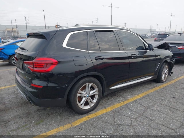 2019 BMW X3 5UXTR7C50KLF34346 Photo 3