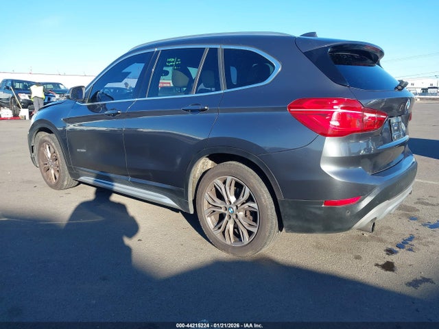 2016 BMW X1 WBXHT3Z36G4A48345 Photo 2