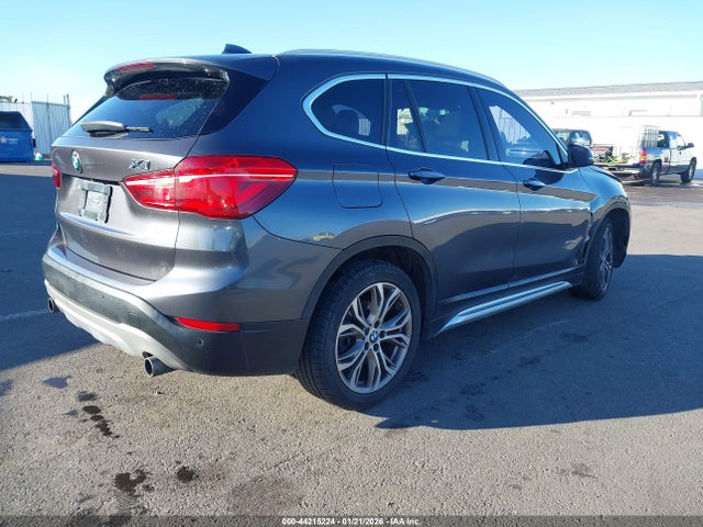 2016 BMW X1 WBXHT3Z36G4A48345 Photo 3