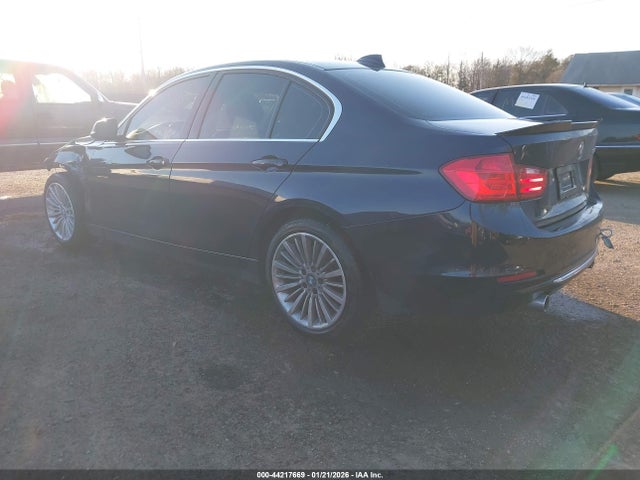 2015 BMW 335I WBA3A9C57FKW74159 Photo 2
