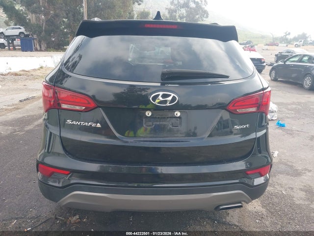 5NMZU3LB5HH032772 Hyundai Santa Fe Sport 2.4l