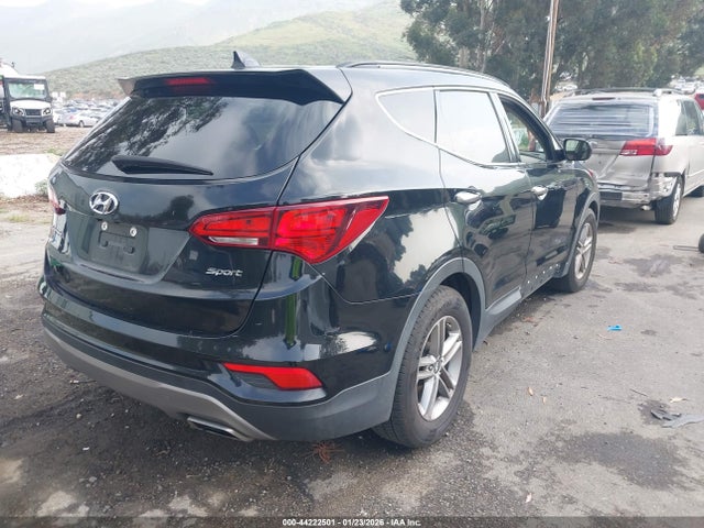 5NMZU3LB5HH032772 Hyundai Santa Fe Sport 2.4l