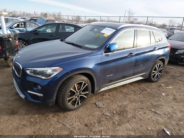 2016 BMW X1 WBXHT3C30G5E55855 Photo 1