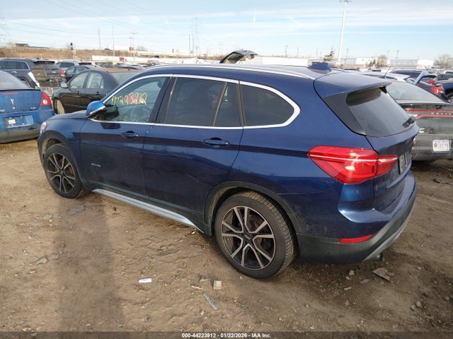 2016 BMW X1 WBXHT3C30G5E55855 Photo 2