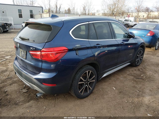 2016 BMW X1 WBXHT3C30G5E55855 Photo 3