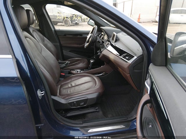 2016 BMW X1 WBXHT3C30G5E55855 Photo 4