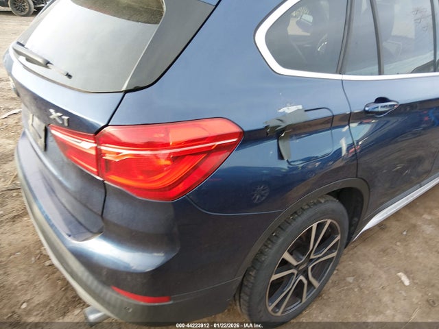 2016 BMW X1 WBXHT3C30G5E55855 Photo 5