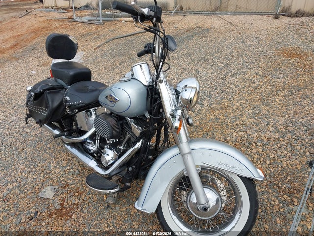 2011 HARLEY-DAVIDSON FLSTC 1HD1BW514BB023063