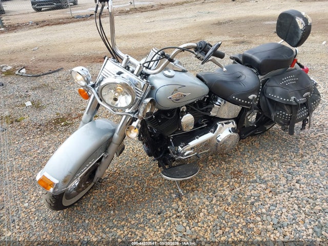 2011 HARLEY-DAVIDSON FLSTC 1HD1BW514BB023063 Photo 1