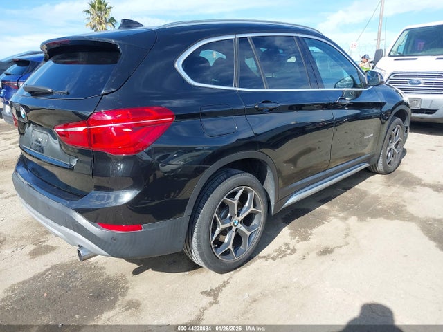 2017 BMW X1 WBXHU7C30H5H33434 Photo 3