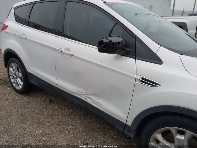 1FMCU0J98GUC91487 Ford Escape Titanium