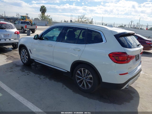 2019 BMW X3 5UXTR7C56KLE94726 Photo 2