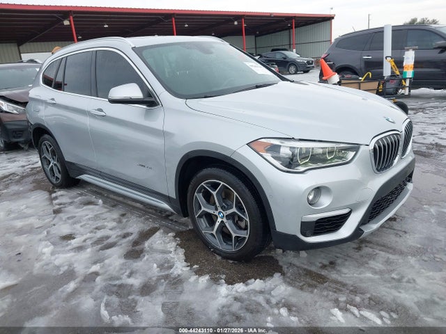 2016 BMW X1 WBXHT3C36G5F64885 Photo 0