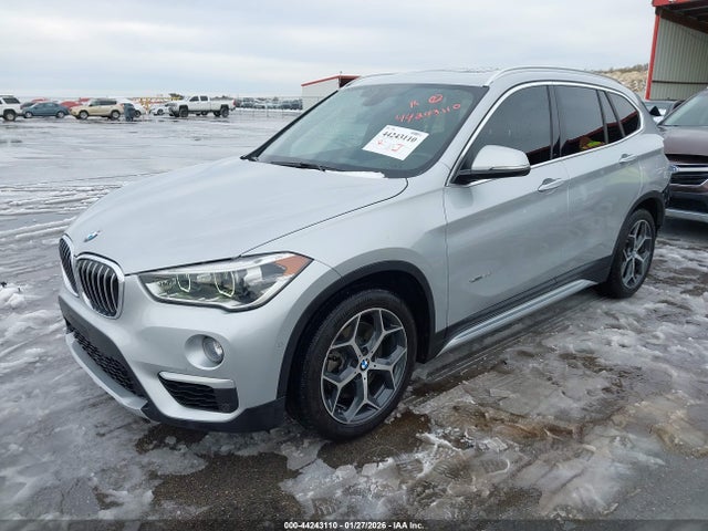 2016 BMW X1 WBXHT3C36G5F64885 Photo 1