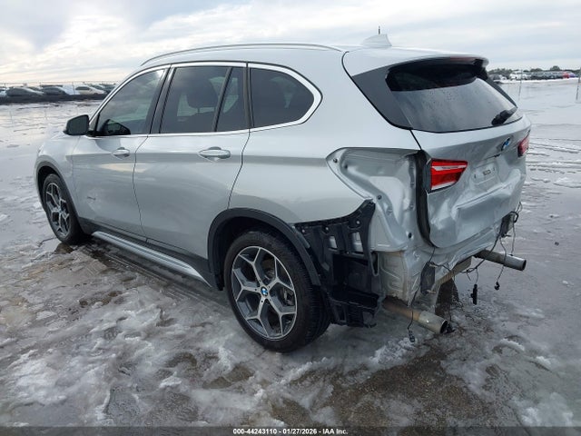 2016 BMW X1 WBXHT3C36G5F64885 Photo 2