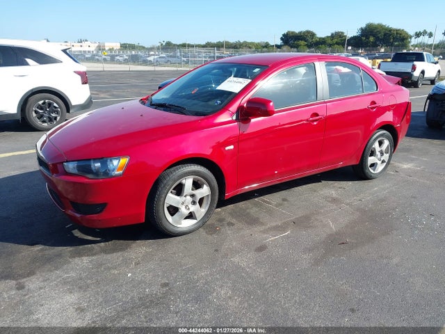 2009 MITSUBISHI LANCER JA3AU16U99U027291 Photo 1